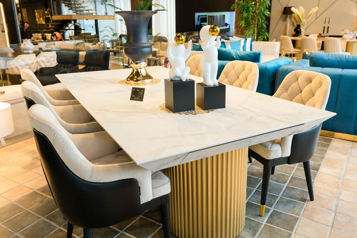 Dining tables in sintered stone, travertine, glass and solid wood, with upholstered dining chairs and counter stools, ma