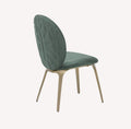 Rose sage velvet dining chair with embossed oval back