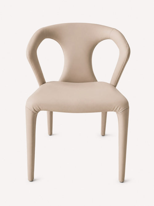 Agos blush vegan leather dining chair with open looping back