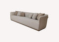 Christy long low greige sofa with curved arms