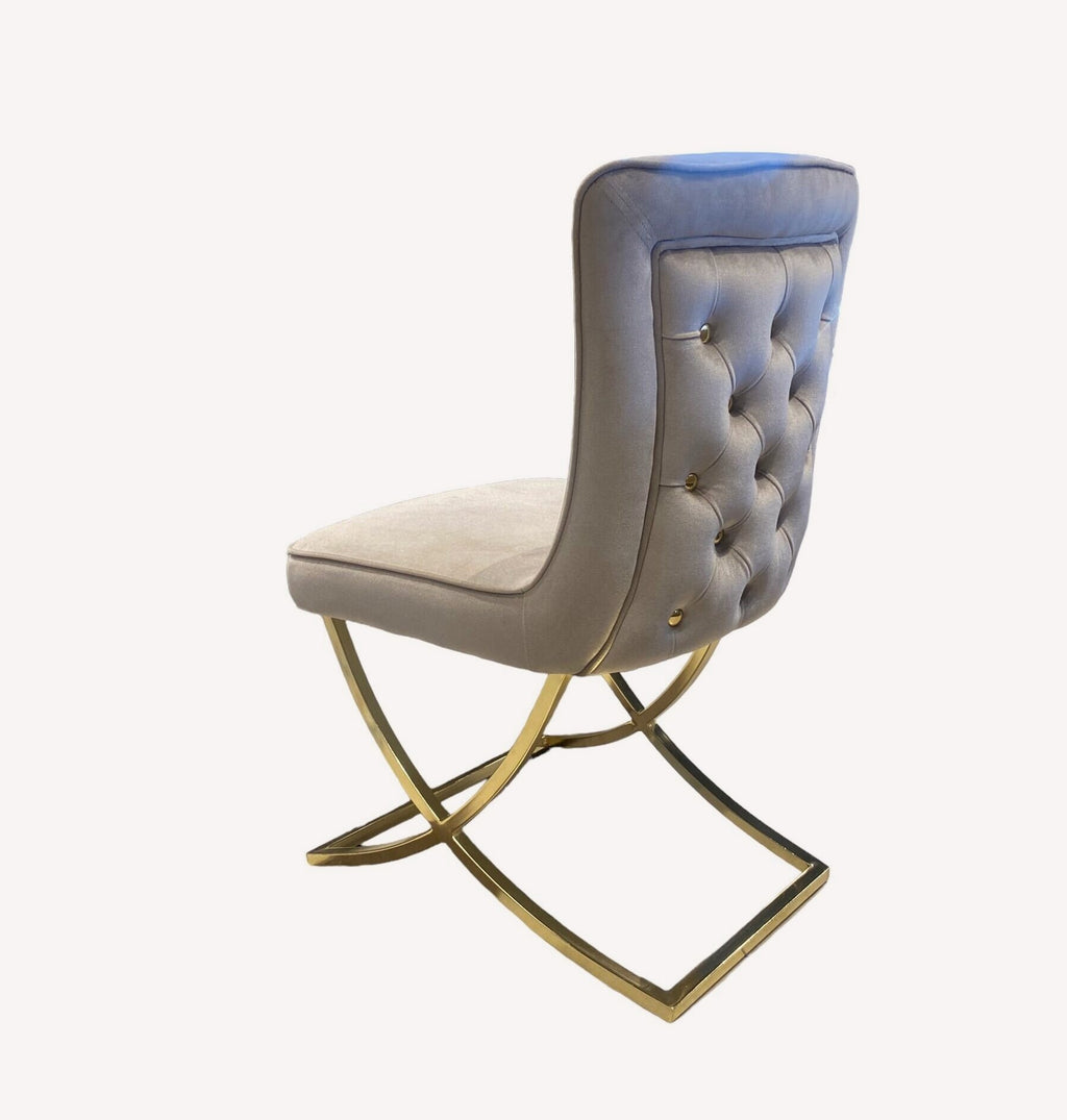 Calvin button tufted velvet dining chair on gold sled legs