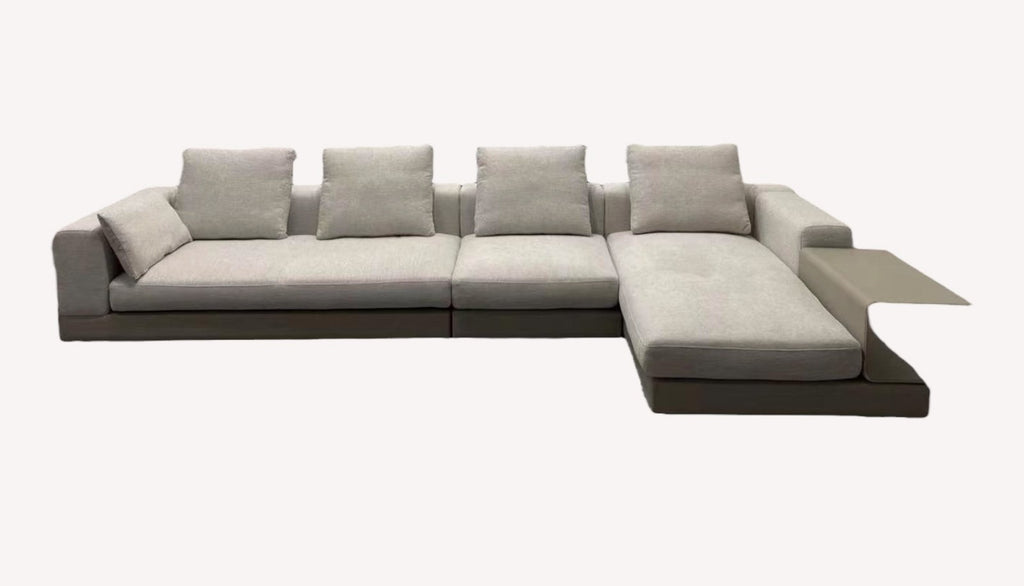 Vietnam low gray chaise sectional on dark platform with side shelf