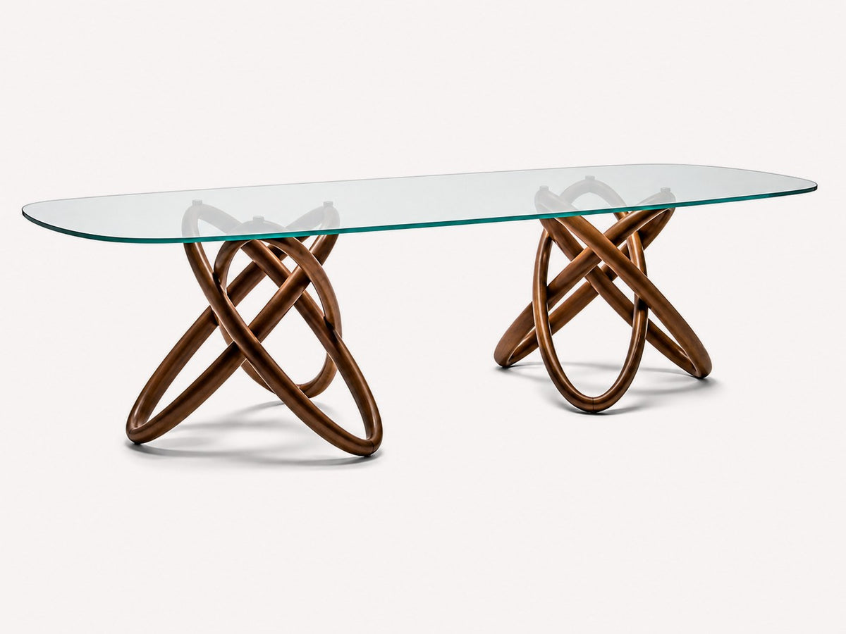 Orian rectangular glass dining table on sculptural interlocking wood base