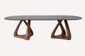 Eitan XL smoked glass dining table on two sculptural solid wood bases