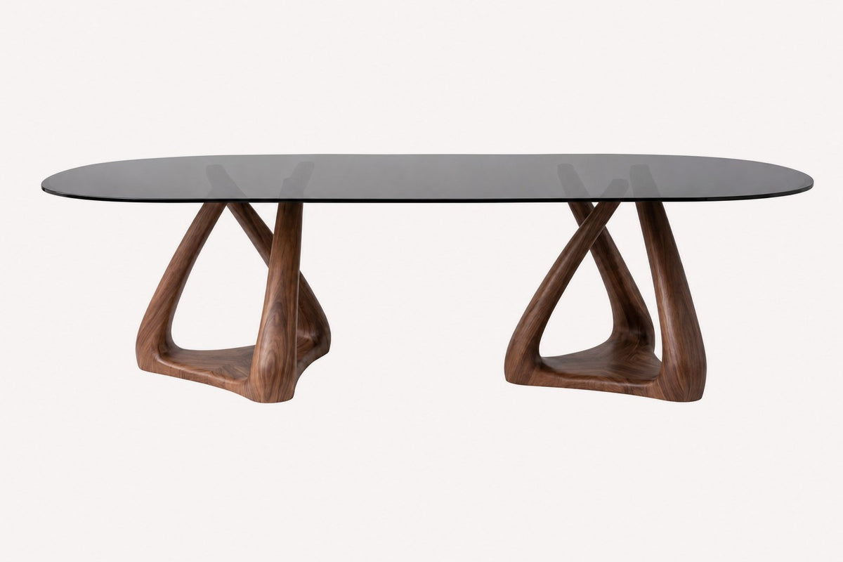 Eitan XL smoked glass dining table on two sculptural solid wood bases
