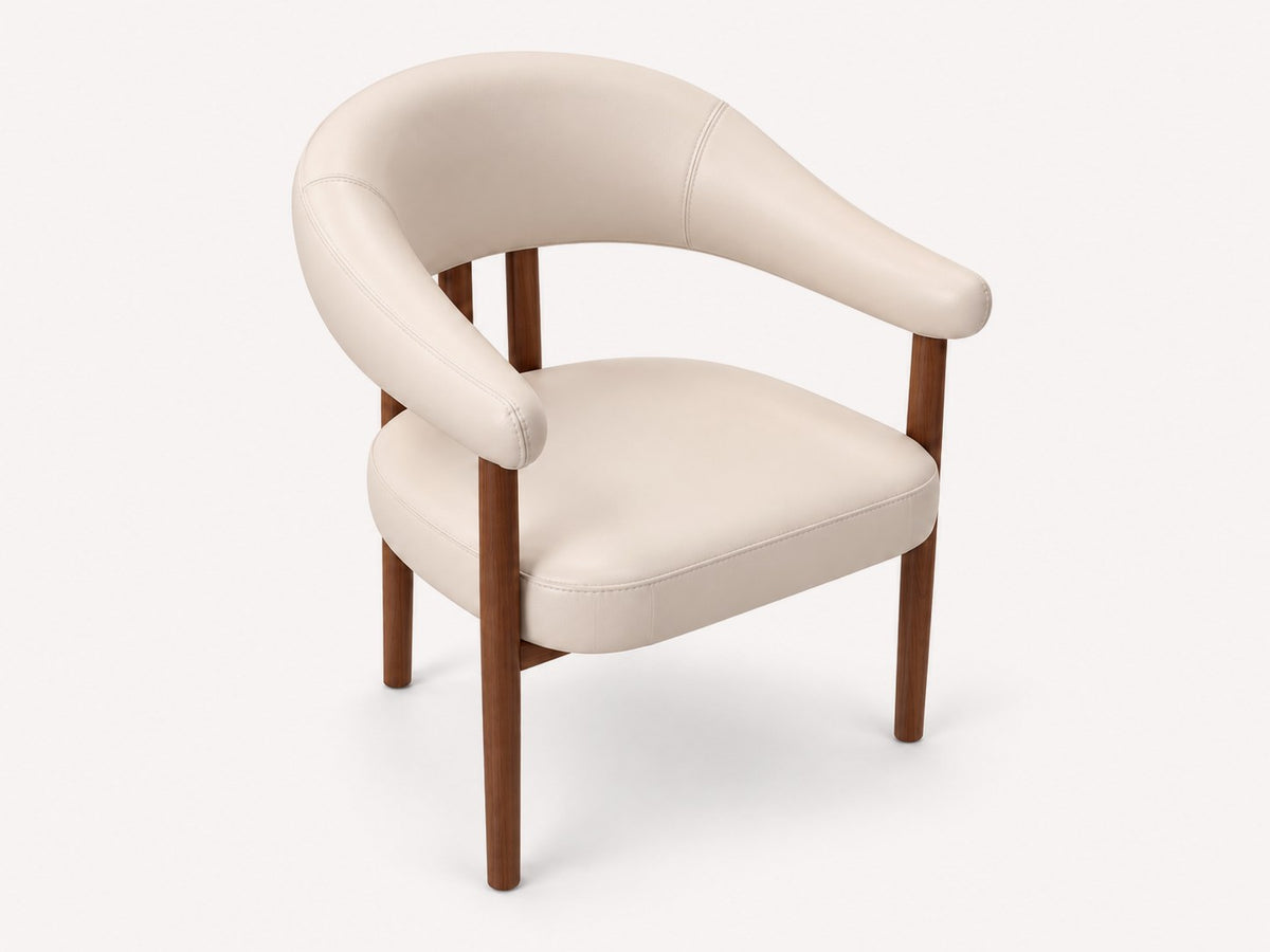 Milo curved dining armchair in cream vegan leather with walnut-tone legs