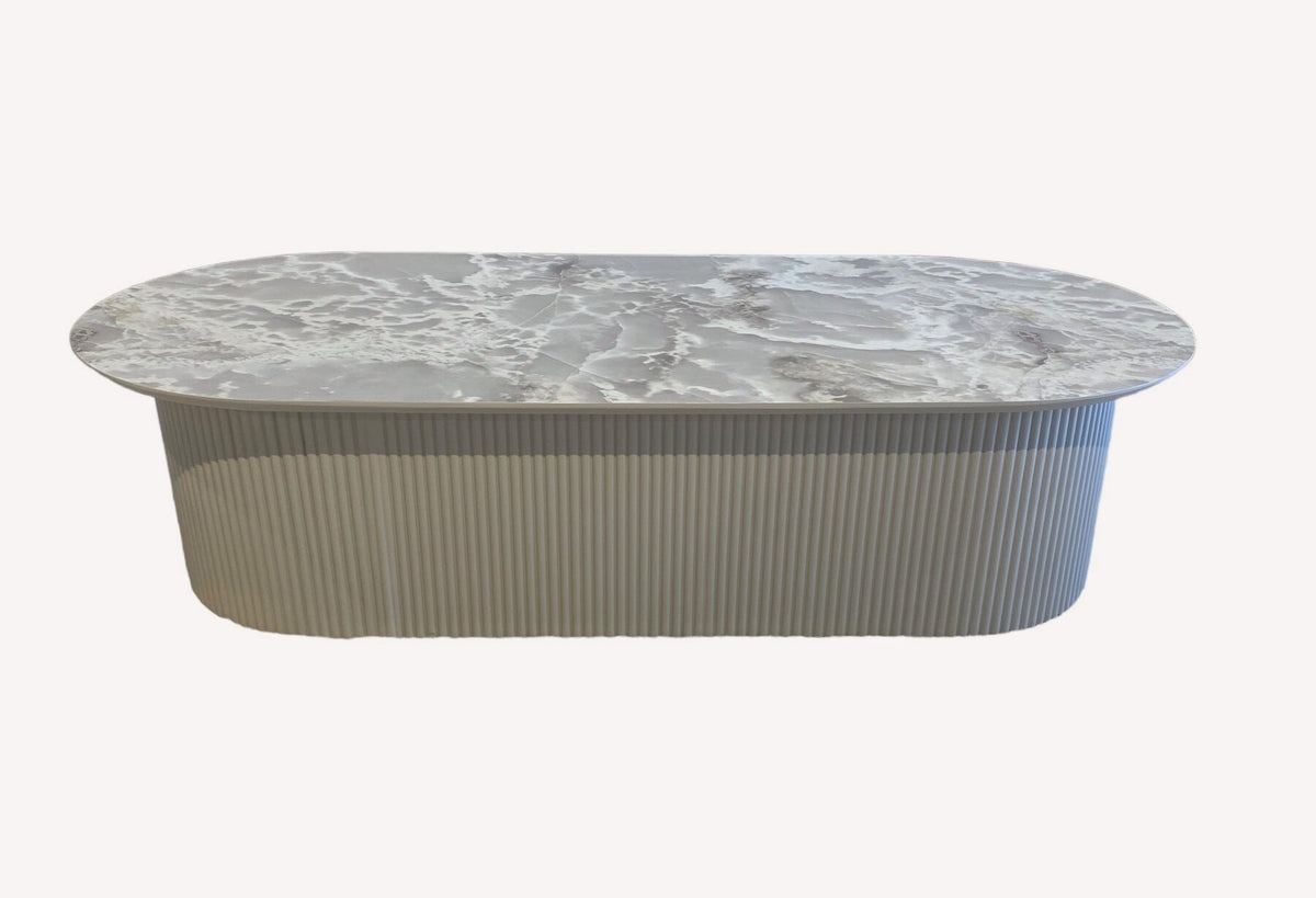 Star oval marble look coffee table on fluted ivory base