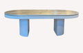 Orlando oval dining table with fluted apron and pedestals