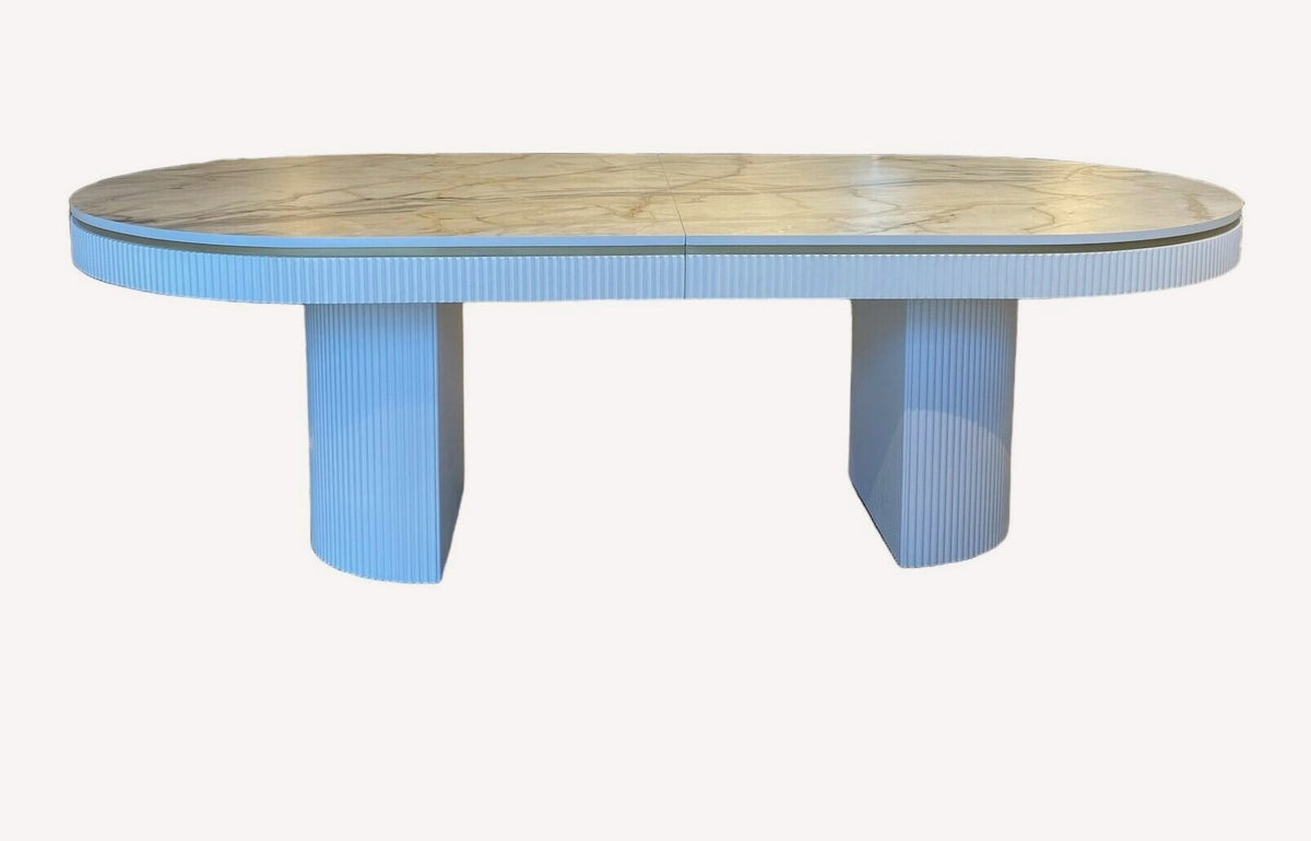 Orlando oval dining table with fluted apron and pedestals
