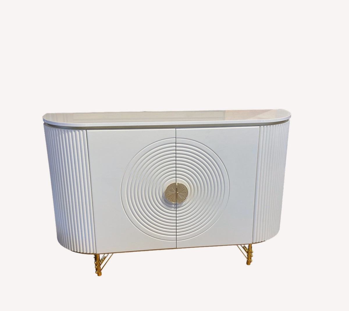 Valencia white sideboard with concentric circle doors and gold legs