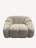 Calimero oversized sculptural lounge chair in neutral fabric