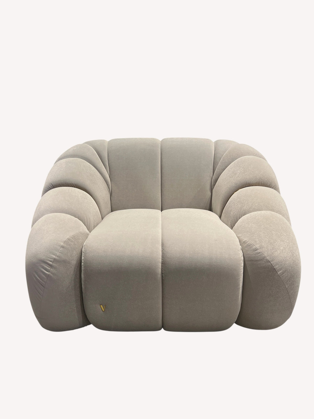 Calimero oversized sculptural lounge chair in neutral fabric