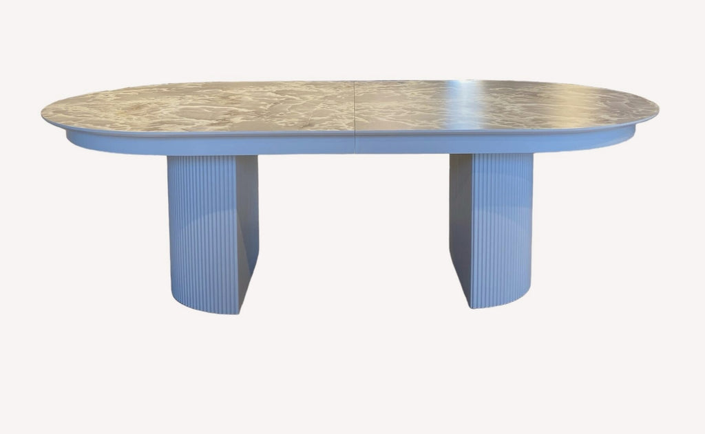 Dublin oval dining table on two fluted white pedestals