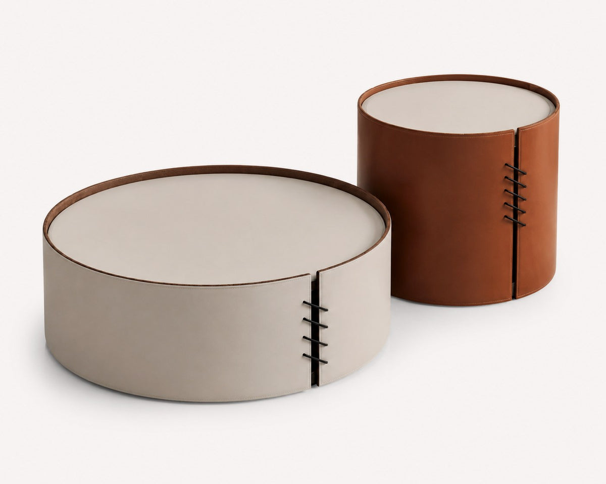 Varso pair of round vegan leather wrapped tables in cream and caramel