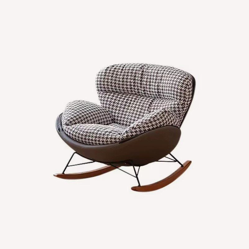 Marbella rocking lounge chair with houndstooth cushions and dark shell