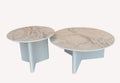 Diamond pair of round marble look tables on fluted white bases