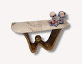 Golden wall mounted console with marble look top and bronze wave base