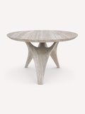 Mykonos round travertine-look dining table with sculptural pedestal