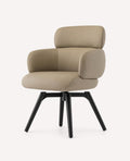 Nola swivel dining armchair in vegan leather with solid wood legs