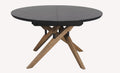 Scala round charcoal dining table on crossed wood legs