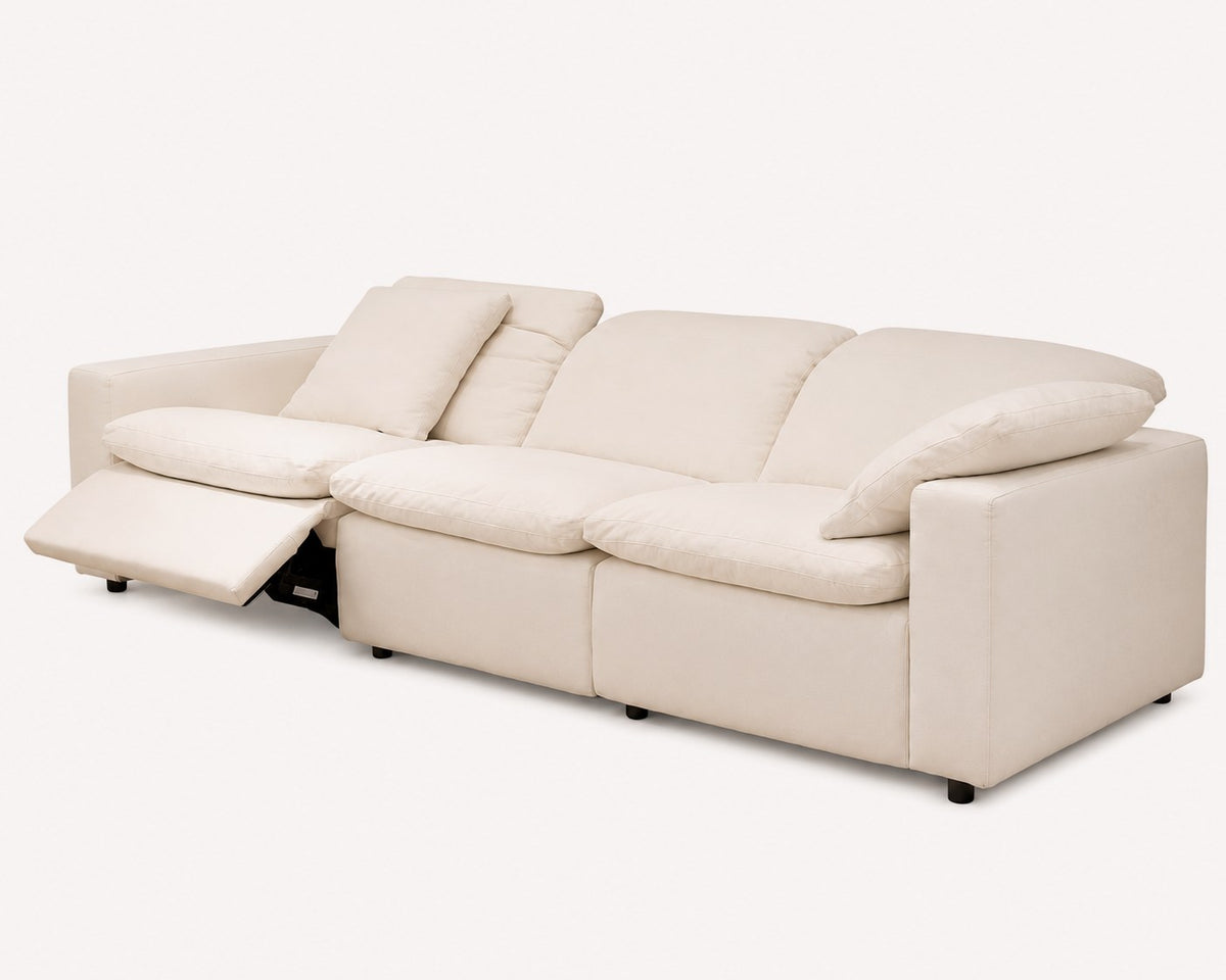 Marseille modern reclining sofa with oversized cushions in light fabric