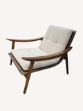 Sierra round rocking lounge chair with dark shell and plush cushions