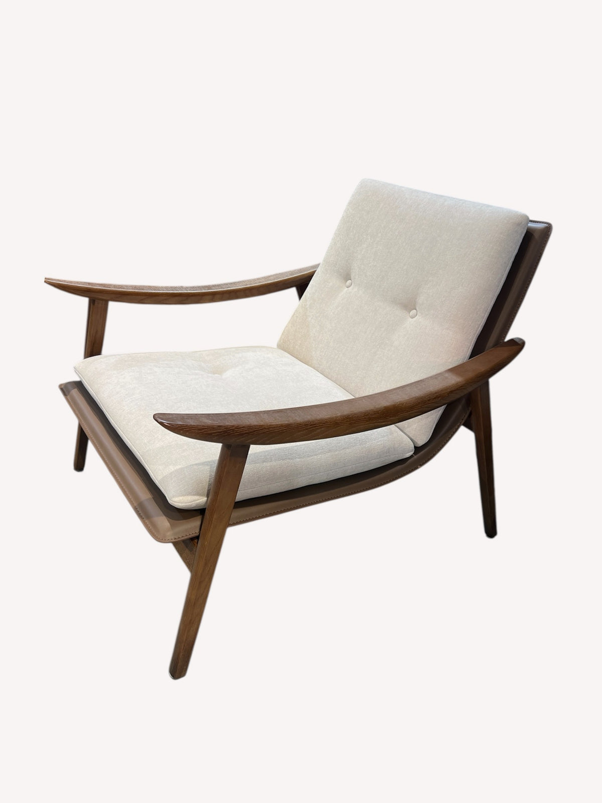 Sierra round rocking lounge chair with dark shell and plush cushions