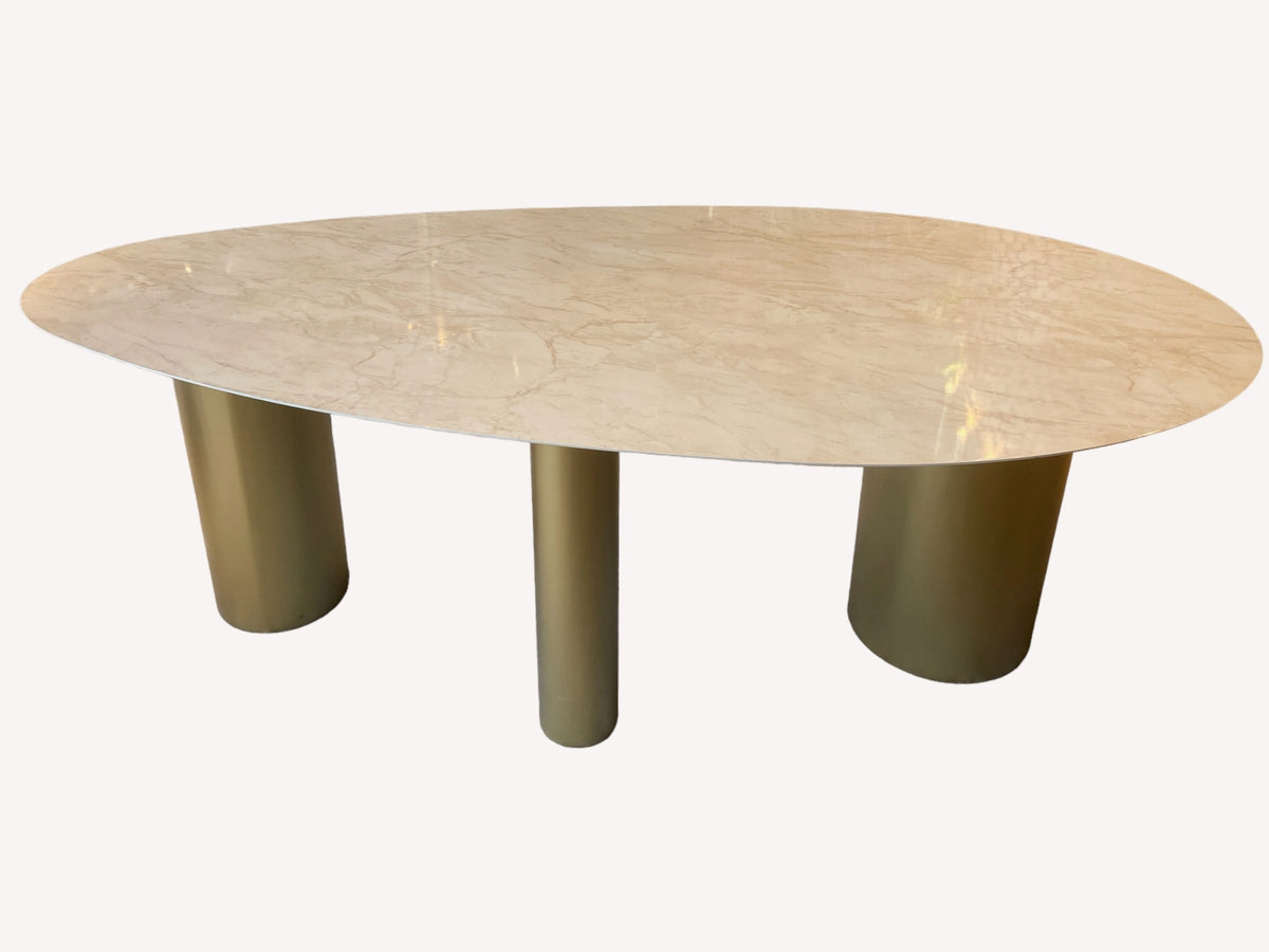 Kinder organic oval marble look dining table on gold cylinders