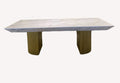 King marble look dining table on fluted gold pedestals