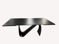 Busto black porcelain dining table on sweeping black base