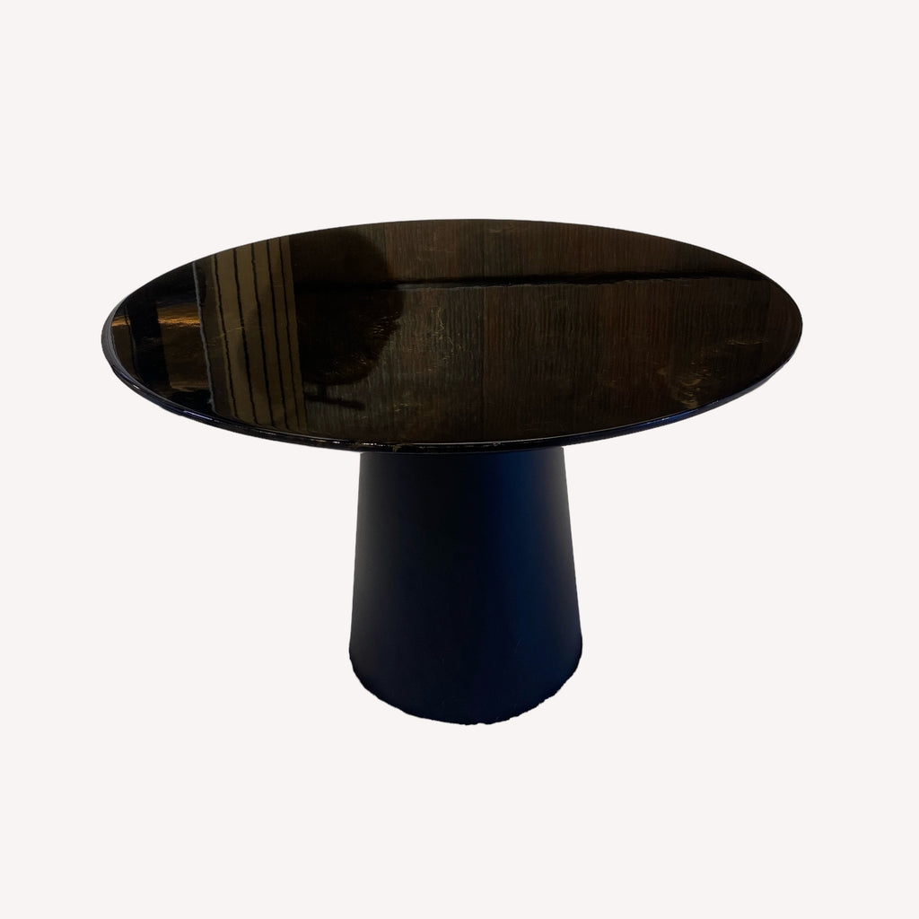 Black glossy round liquid marble coffee table on tapered pedestal
