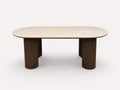 Yavan organic dining table with travertine-tone top on fluted walnut base