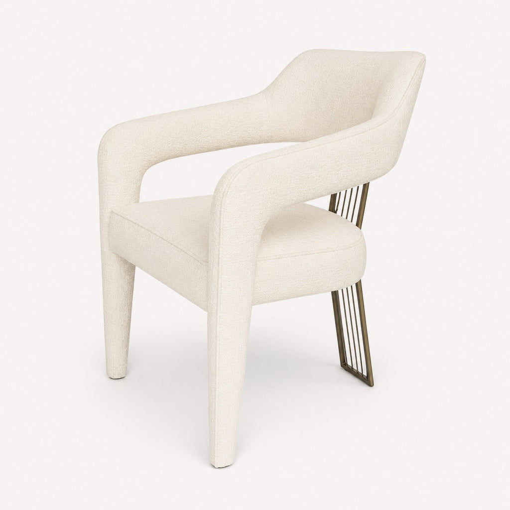 Dorian upholstered dining armchair with stainless steel back accent
