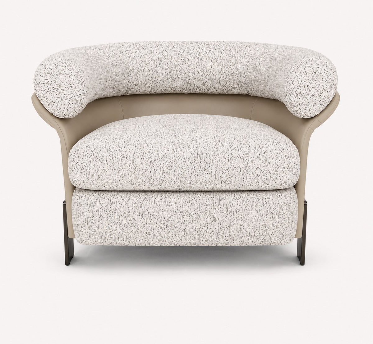 Aristo rounded accent chair with leather exterior and metal legs
