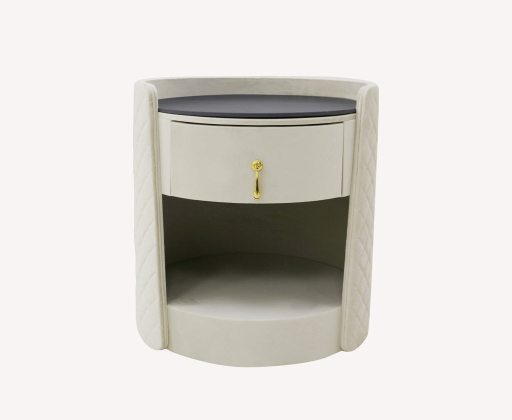 Weekend rounded cream quilted nightstand with black top and gold pull