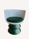 Toscana sculptural chair with round seat on dramatic base
