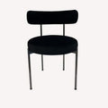 Moon black velvet dining chair with round seat and bolster back