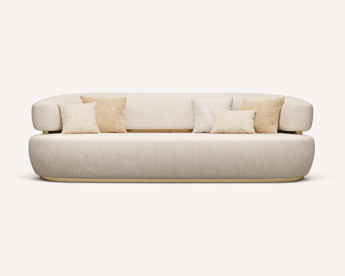 Hong Kong rounded sahara leather sofa with gold base band