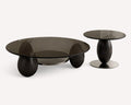 Black Gaia amber glass coffee tables on dark solid wood legs