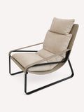 Atlas lounge chair with thick cushions on slim black metal frame