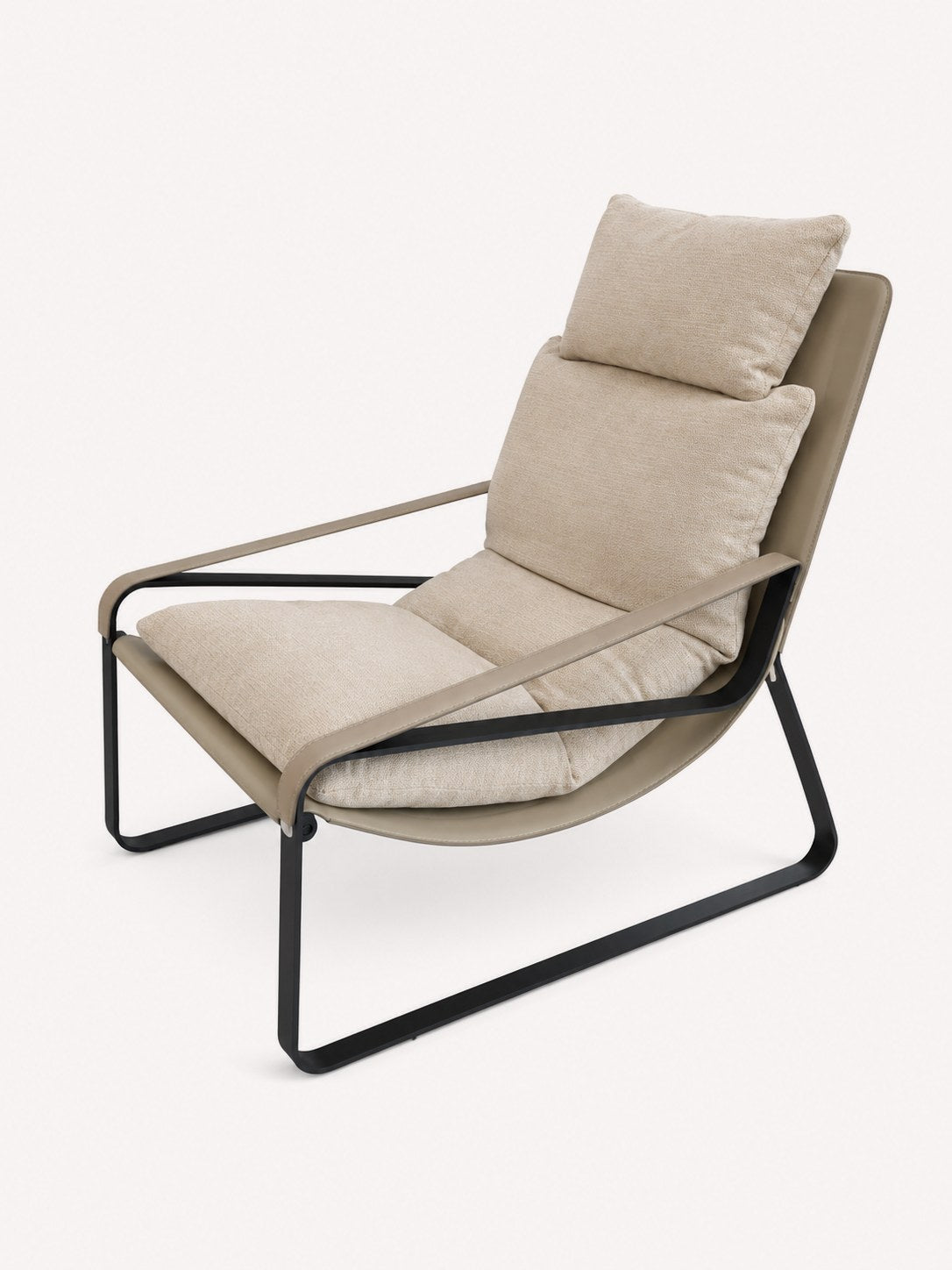 Atlas lounge chair with thick cushions on slim black metal frame