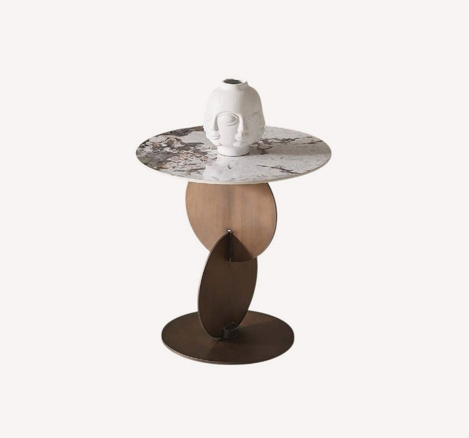 Round side table with marble look top on intersecting bronze discs