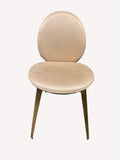 Rose beige velvet dining chair with oval back and gold legs