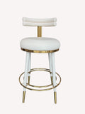 Carolina counter stool with double roll back and polished gold details