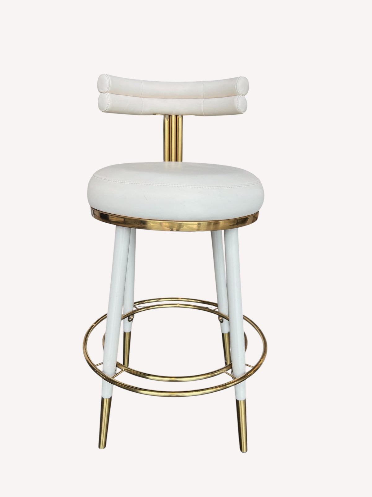 Carolina counter stool with double roll back and polished gold details
