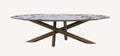 Oliver oval marble look porcelain dining table on crossed bronze base