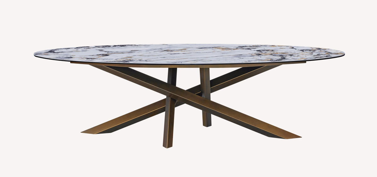 Oliver oval marble look porcelain dining table on crossed bronze base