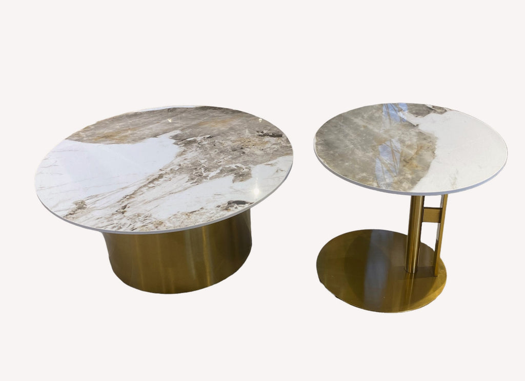 Golden pair of round granite tables on gold legs, view 2