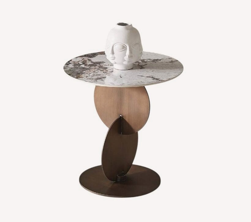 Round side table with marble look top on intersecting bronze discs, view 2