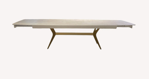 Bell dining table with light top and angled bronze legs, view 2